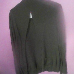 a button down long sleeve dark green shirt.